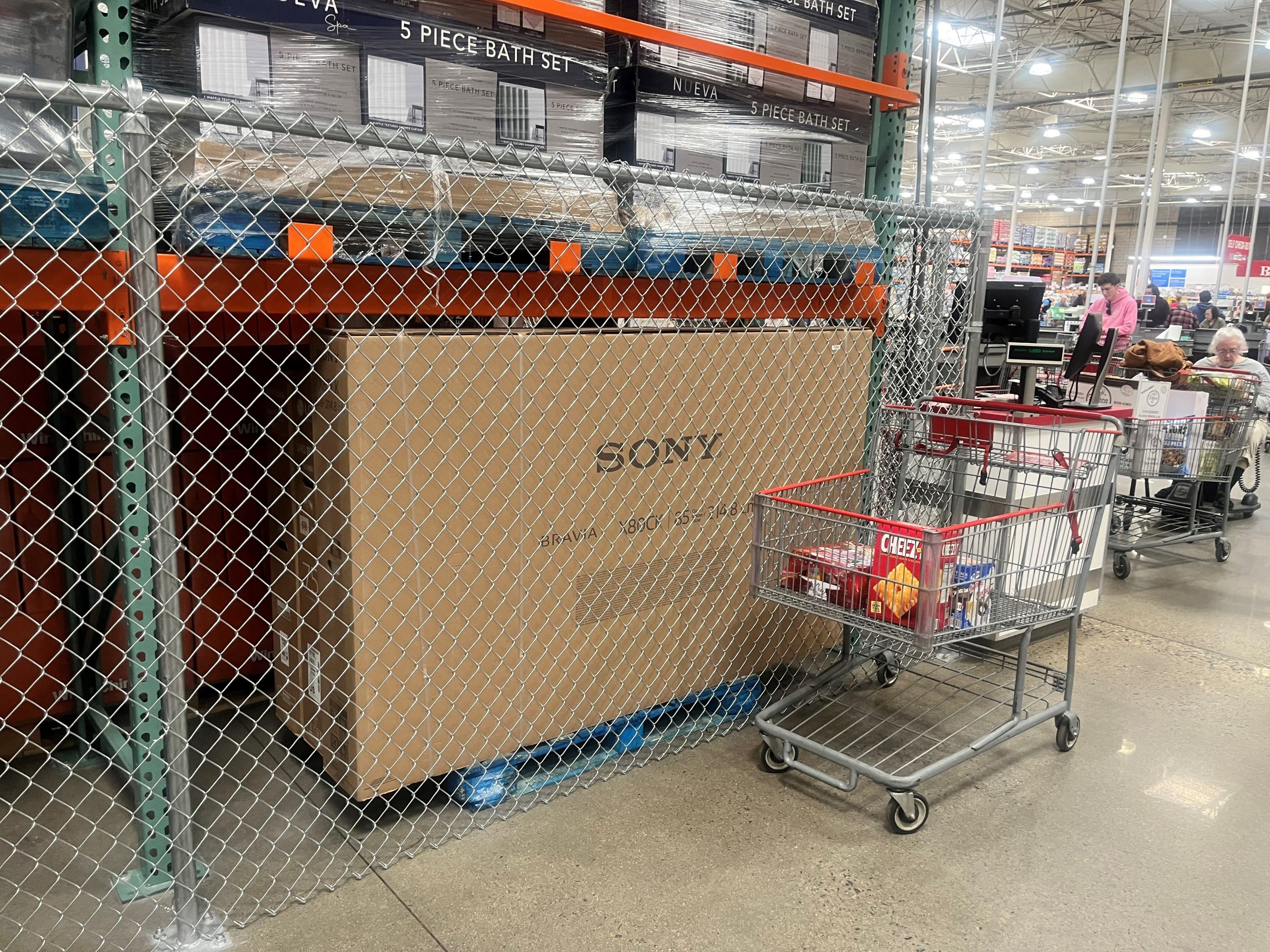 Chain link fence installation inside a commercial warehouse in Denver Colorado