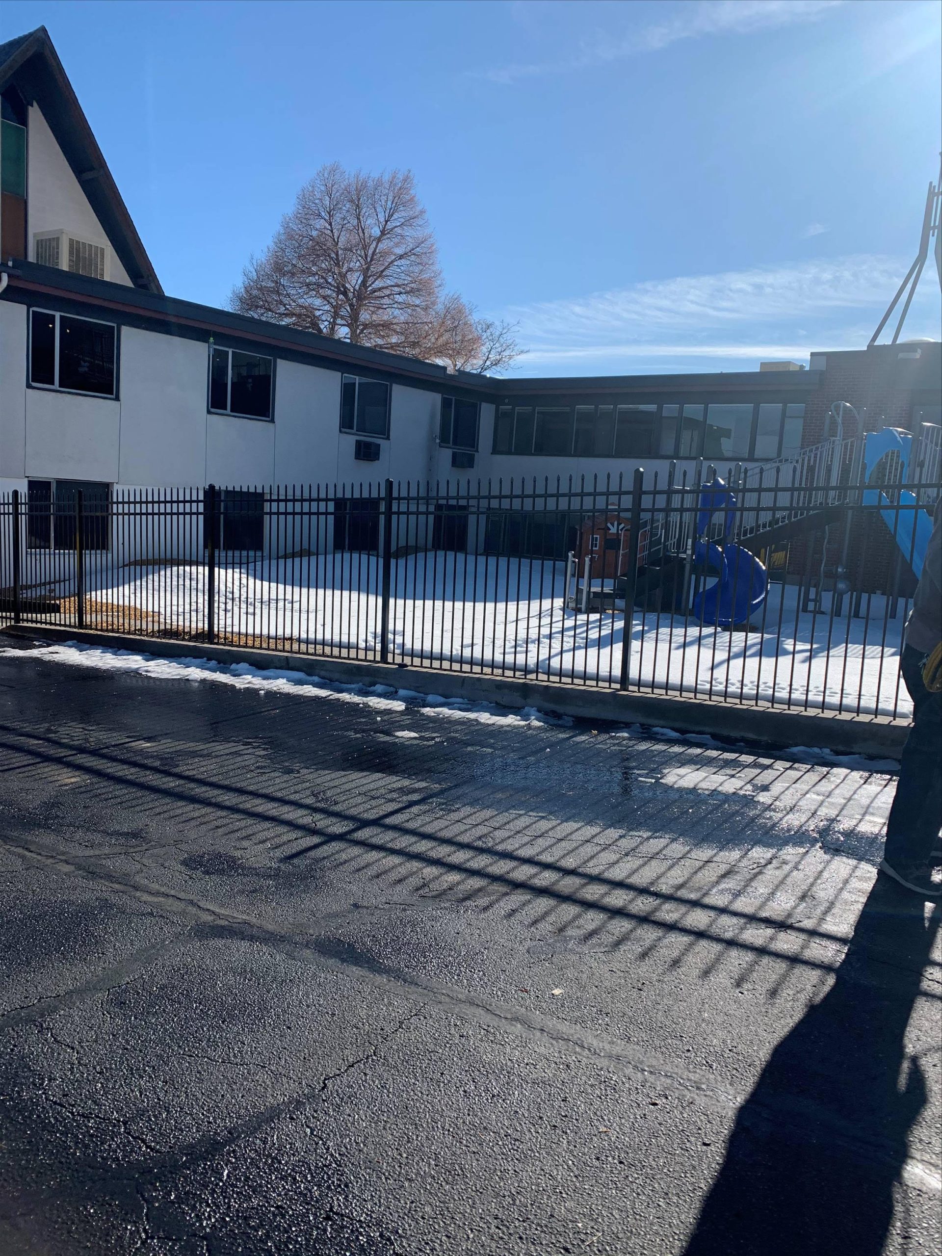 Metal perimeter fence installed around a Denver area school playground