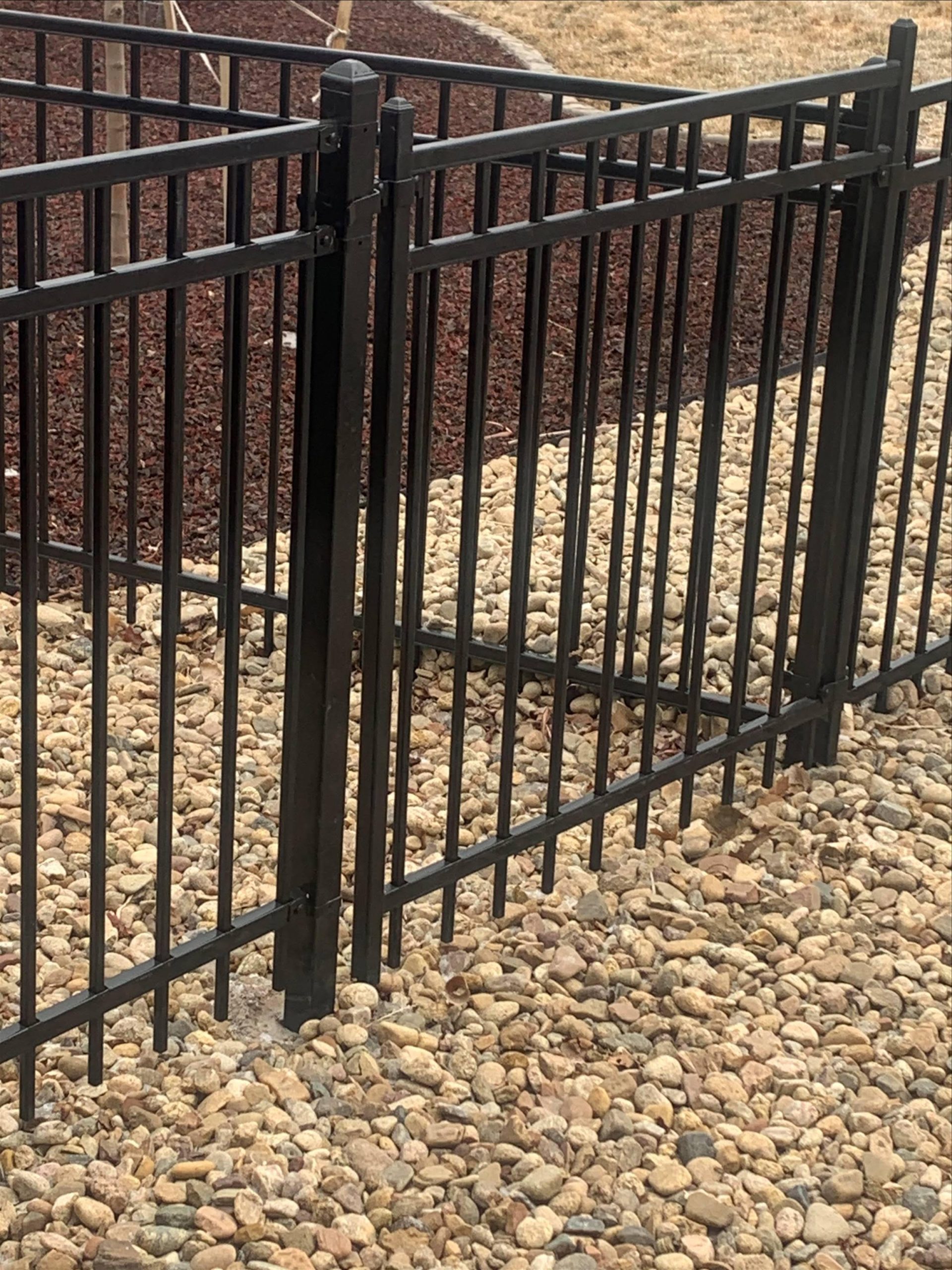 Heavy-duty steel commercial gate system installed for durability in Denver